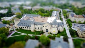 tilt shift photo of college campus buildings